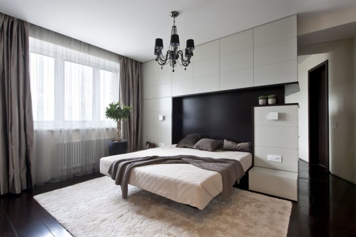 lampadario in camera da letto con soffitti tesi
