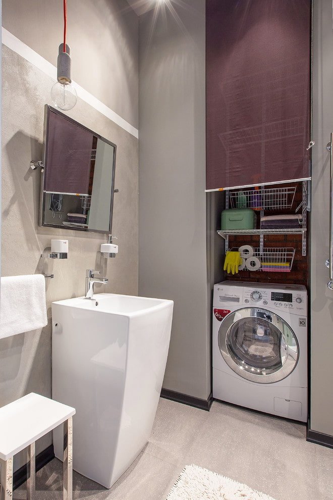 nicchia con lavatrice nell'interno del bagno