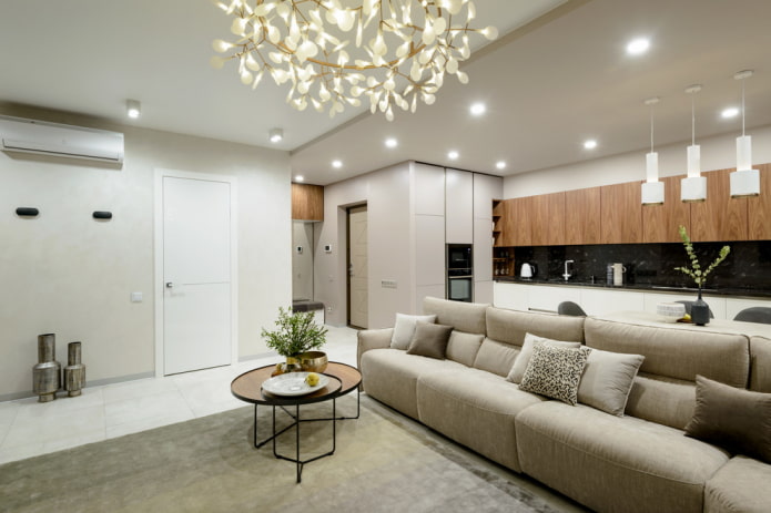 illuminazione a zone all'interno della cucina-soggiorno