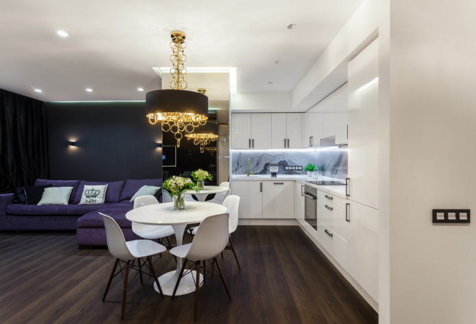 illuminazione a zone all'interno della cucina-soggiorno