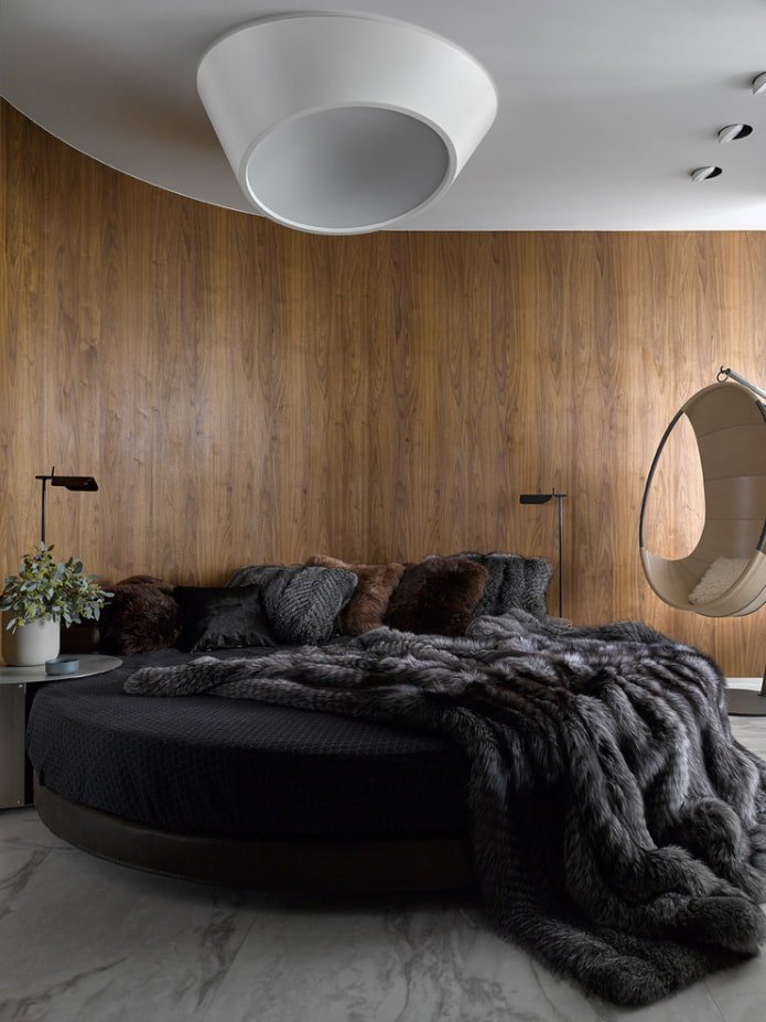 letto rotondo con copriletto all'interno