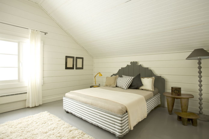 rivestimento camera da letto con assicelle bianche