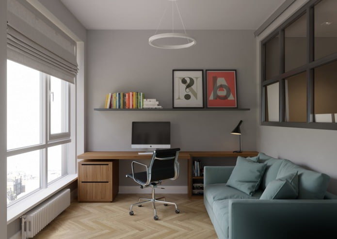 interno di un ufficio con parquet chiaro e pareti grigie