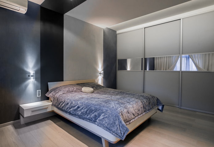 armadio scorrevole nell'interno della camera da letto in stile moderno