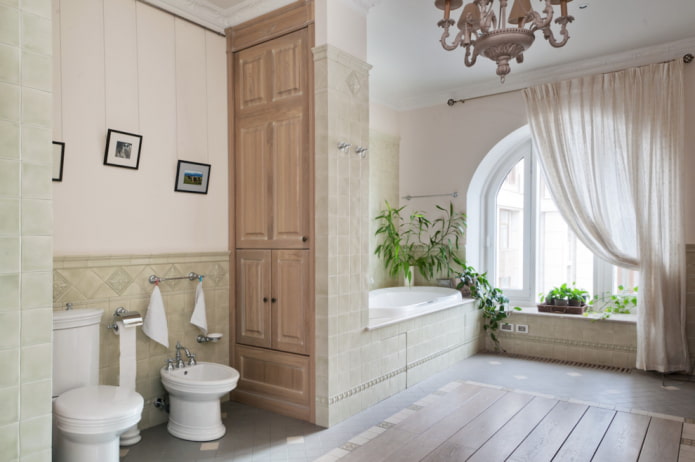un mobiletto a forma di divisorio all'interno del bagno