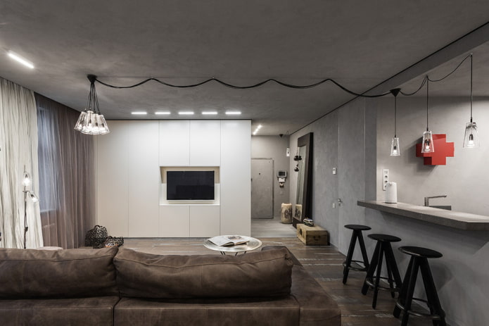 mobile con TV come divisorio all'interno