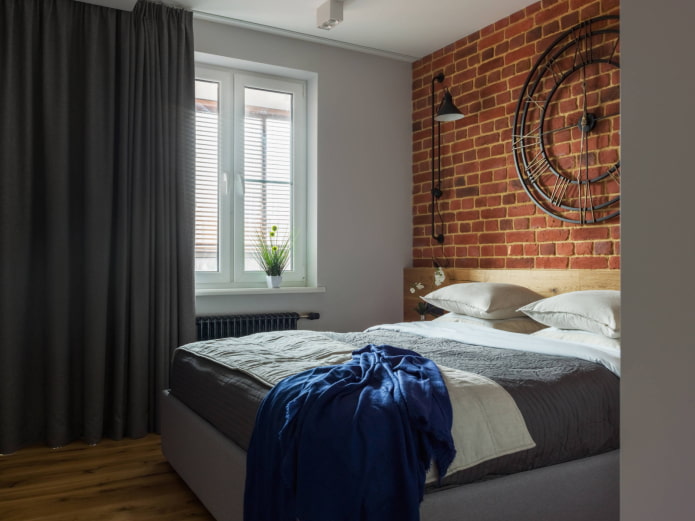 tende nere in una camera da letto in stile loft