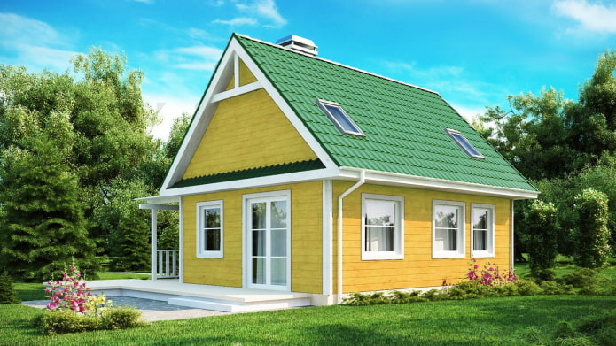 casa di campagna gialla con un tetto verde brillante