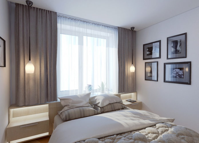 Camera da letto piccola con un letto vicino alla finestra