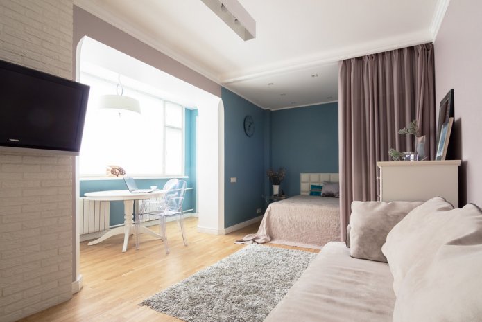 disposizione della camera da letto combinata con un soggiorno
