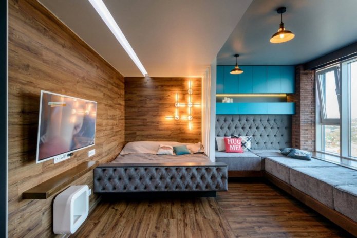 zonizzazione dell'illuminazione nell'interno della camera da letto-soggiorno