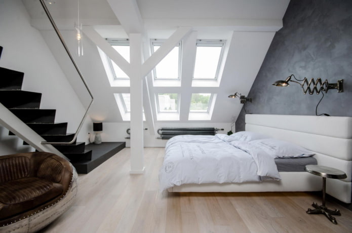 interno di camera da letto mansardata in stile high-tech