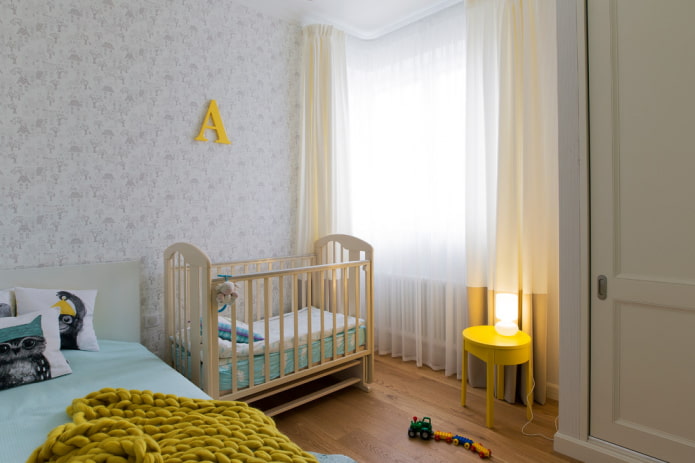 culla per neonati nell'arredamento della camera da letto
