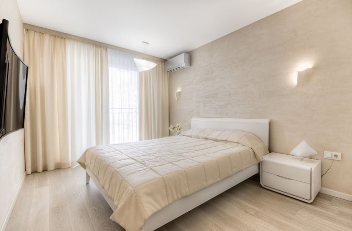 interno della camera da letto bianca e beige