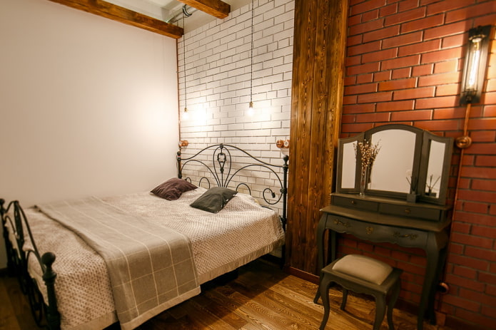 mobili all'interno di una camera da letto in stile industriale