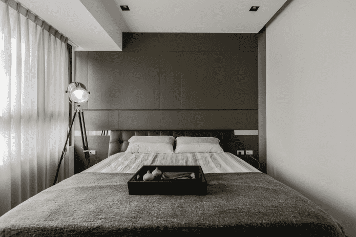 illuminazione all'interno della camera da letto in stile minimalista