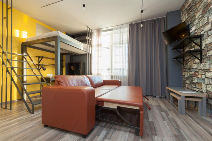 mobili in un monolocale in stile industriale