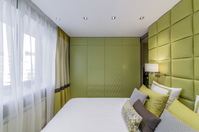 interno della camera da letto nei toni dell'oliva