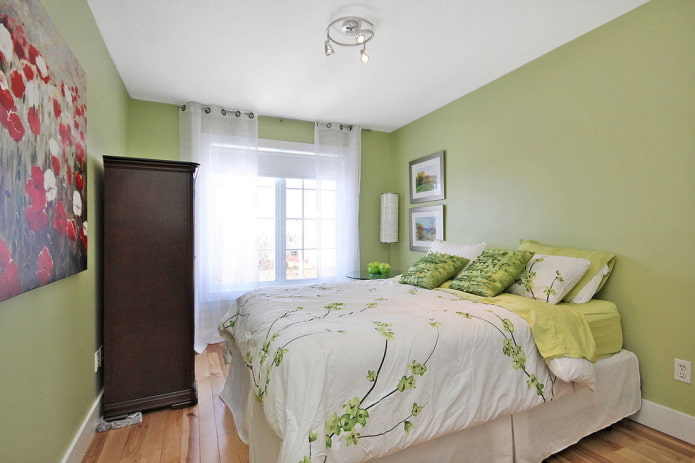 interno della camera da letto in tonalità pistacchio