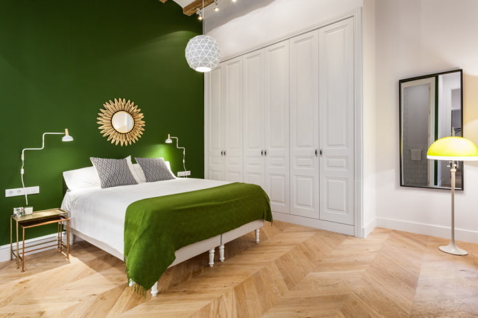 mobili all'interno della camera da letto nei toni del verde