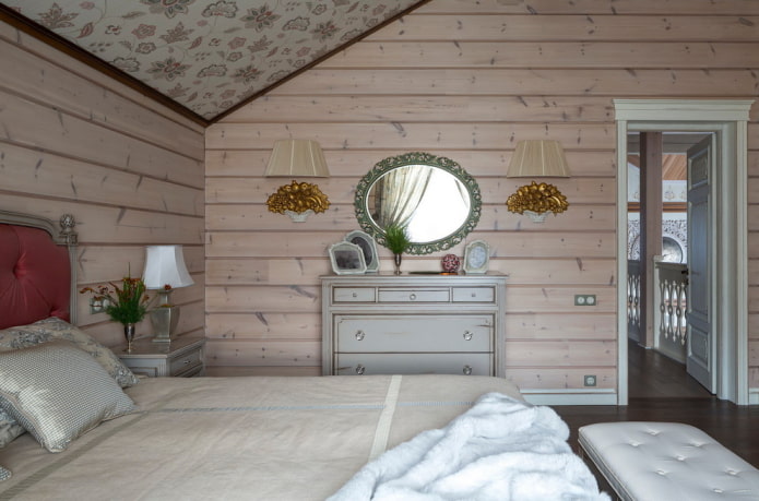 specchio con applique nell'interno della camera da letto