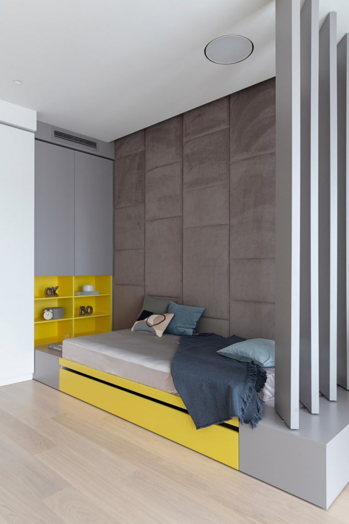 camera da letto minimalista con dettagli gialli